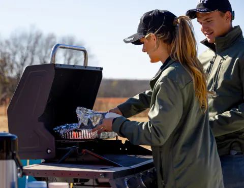 Staff grilling at a Lake Hudson Resort get-together