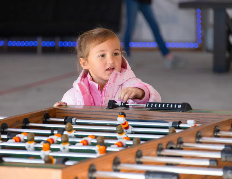 Foosball table in the clubhouse game room at Lake Hudson Resort