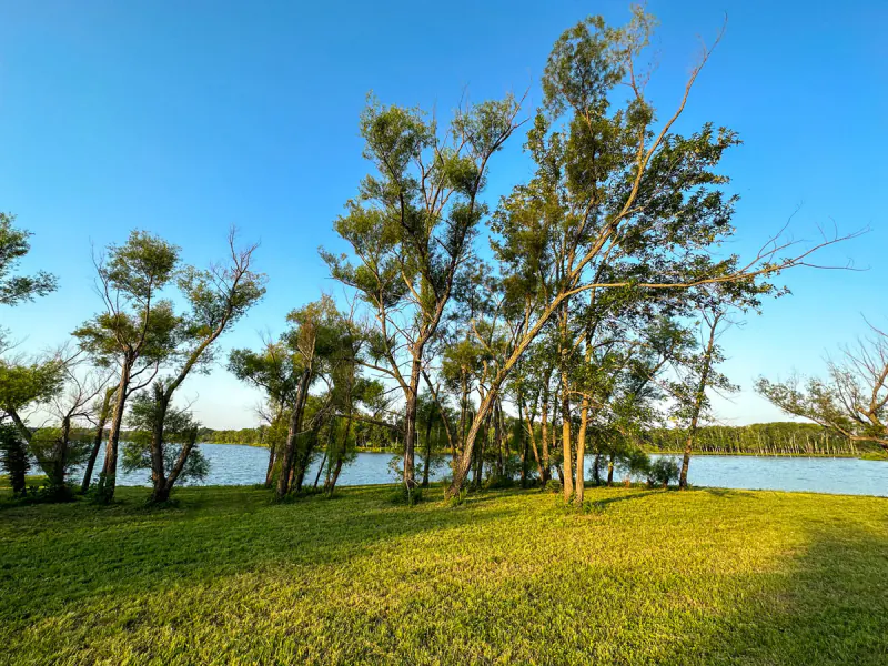 Grassy lakefront along Lake Hudson near Lake Hudson Resort