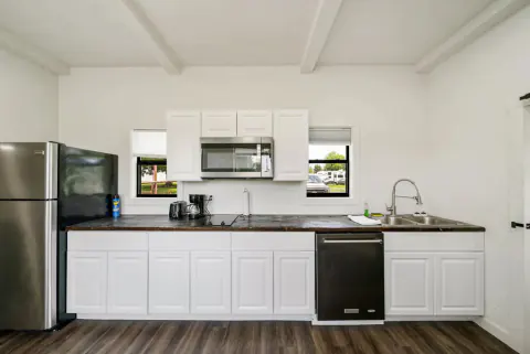 Kitchen with stainless appliances inside the cabin